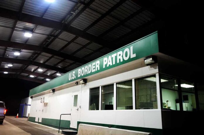 shutterstock_43250812 Border patrol checkpoint building at night