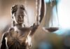 Lady Justice statue holding scales