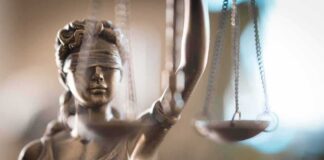 Lady Justice statue holding scales