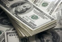 Stack of US 100 dollar bills