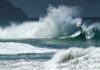 Iconic Arch Gone – Rangers Sound Alarm Crashing ocean waves against the shore under a cloudy sky