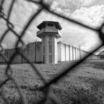 Vegas Court CRUSHES Tupac Plot Boss Prison watchtower behind chain-link fence
