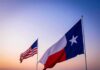 MAGA Loyalty Test Explodes In Texas Texas and United States flags waving at sunset