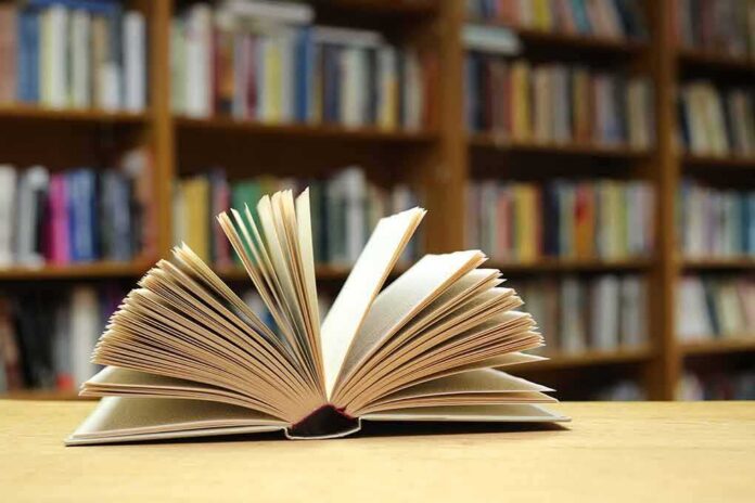 Open book on a table in a library
