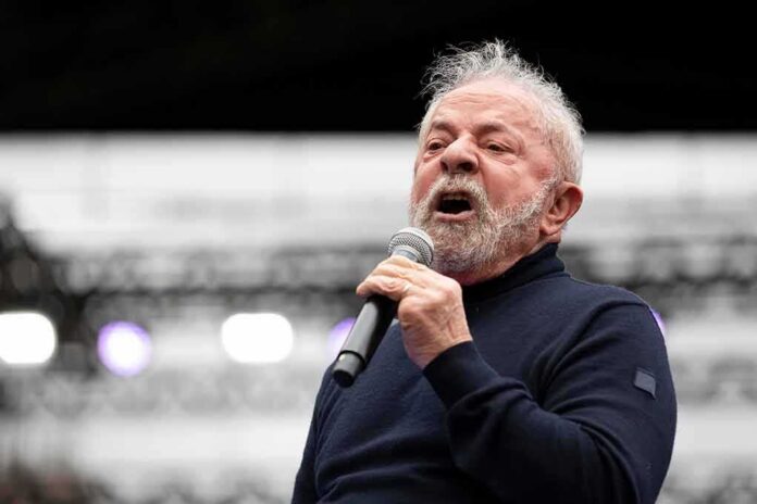 shutterstock_2197241635-2 Luiz Inácio 'Lula' da Silva speaking into a microphone on stage