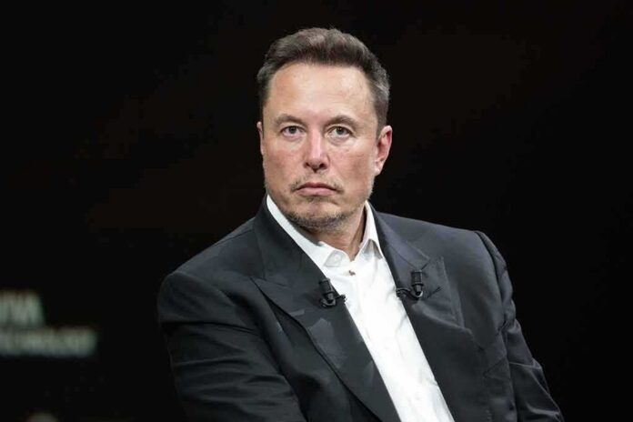 Elon Musk in a dark suit during an onstage talk