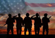 Soldiers saluting at sunset with American flag overlay
