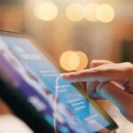 Newsletter Trap? Scary Privacy Case Could Rewire Ad Tracking Hand tapping on a tablet screen