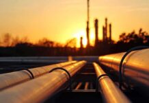 Diesel First: G7 Pulls Rare Emergency Lever Industrial pipelines at sunset