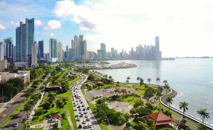 shutterstock_789477430 Coastal city skyline with waterfront park and busy boulevard
