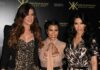 Kardashian Blast Stuns J-Law – Email Ends It Three Kardashian sisters posing together at a fashion event
