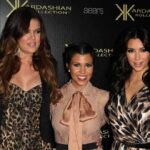 Kardashian Blast Stuns J-Law – Email Ends It Three Kardashian sisters posing together at a fashion event